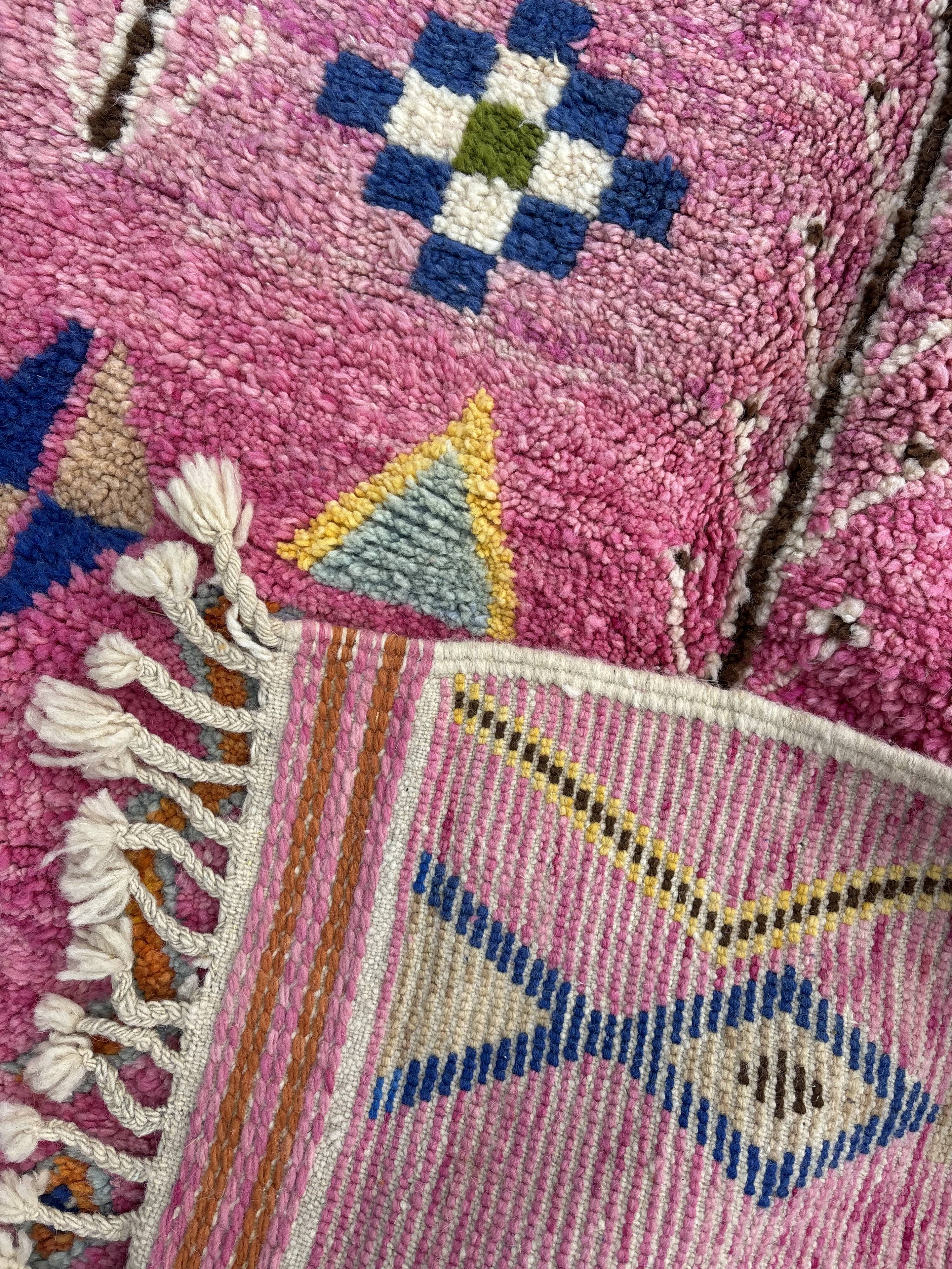 Boho chic Moroccan pink wool rug