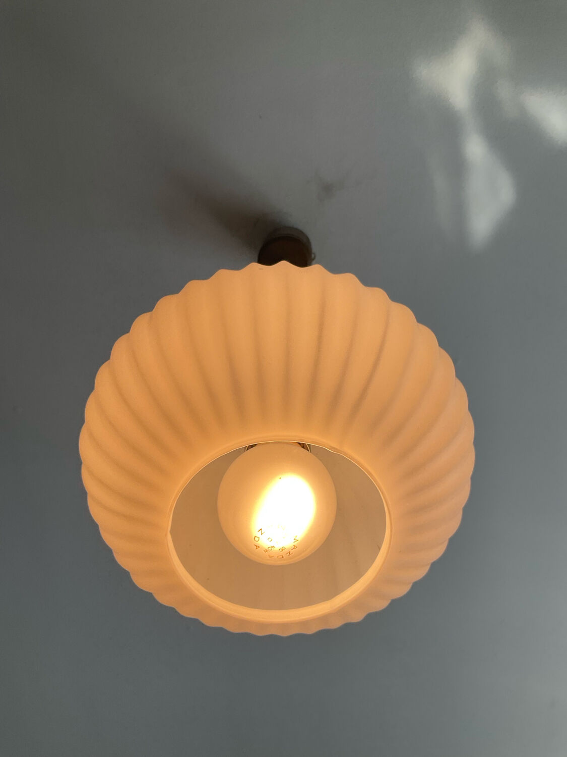 Louis Kalff pendant light in opaline and teak from the 1960s