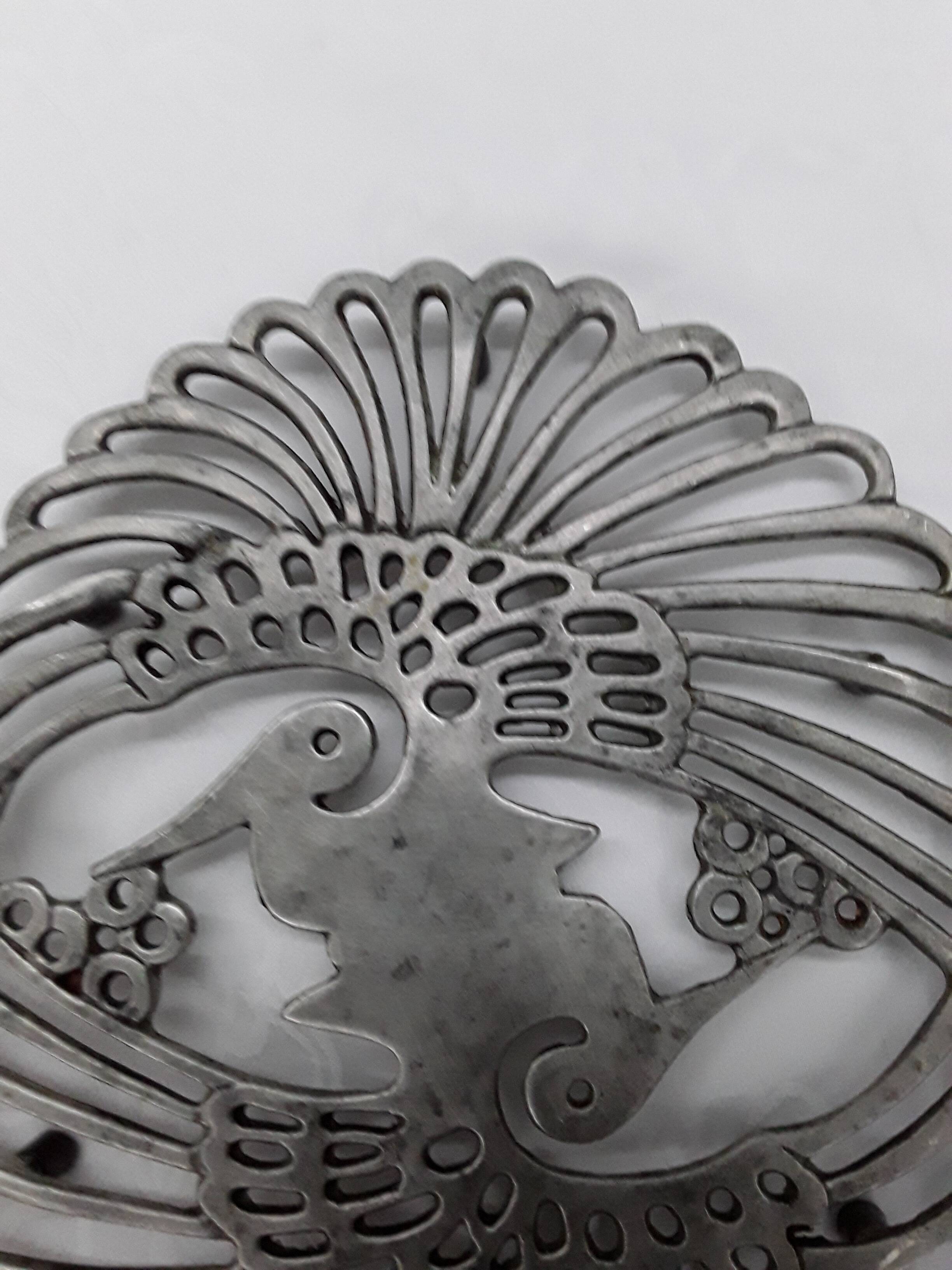 pewter trivet