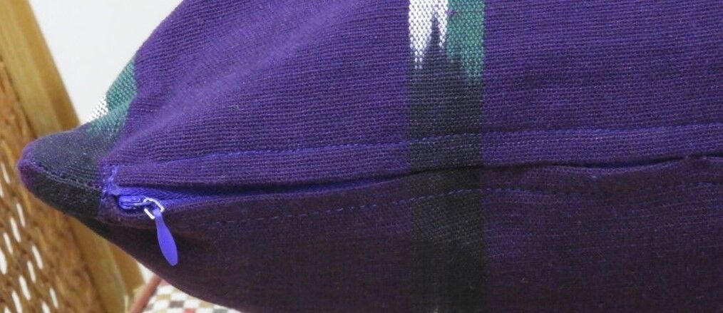 Cushion cover in violet ikat