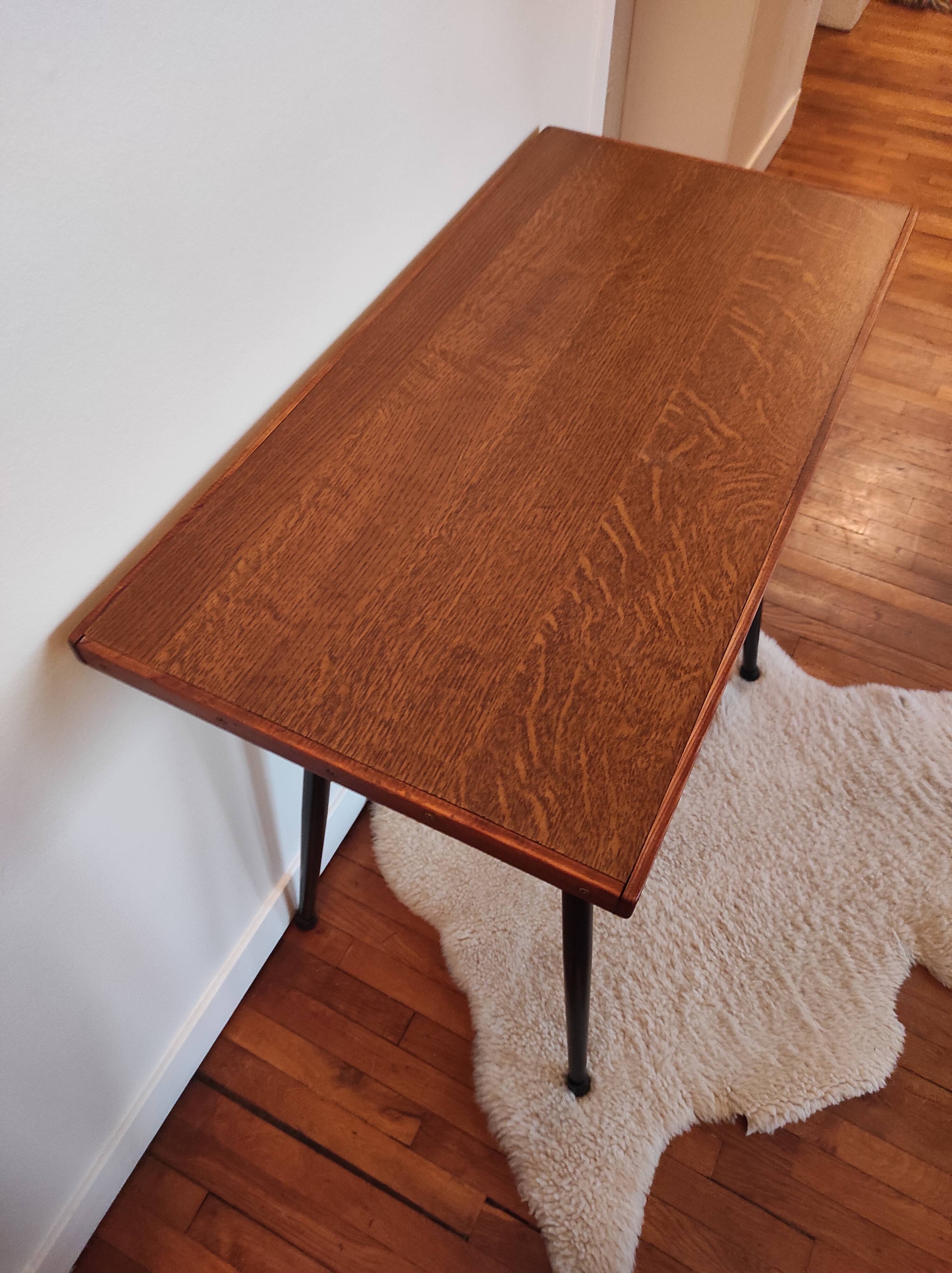 Black metal foot console