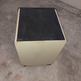 Metal box with used vintage keyless casters