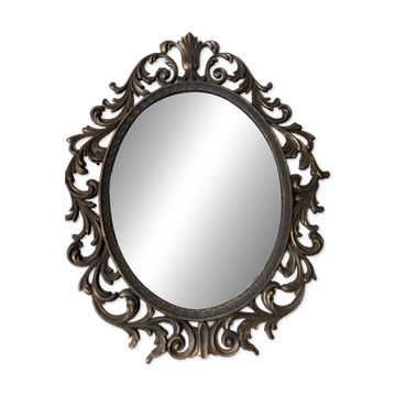 Miroir en bronze à volutes style rocaille