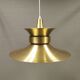 Large hanging lamp, made of brass-coloured aluminium with red and white contrast lacquer inside.