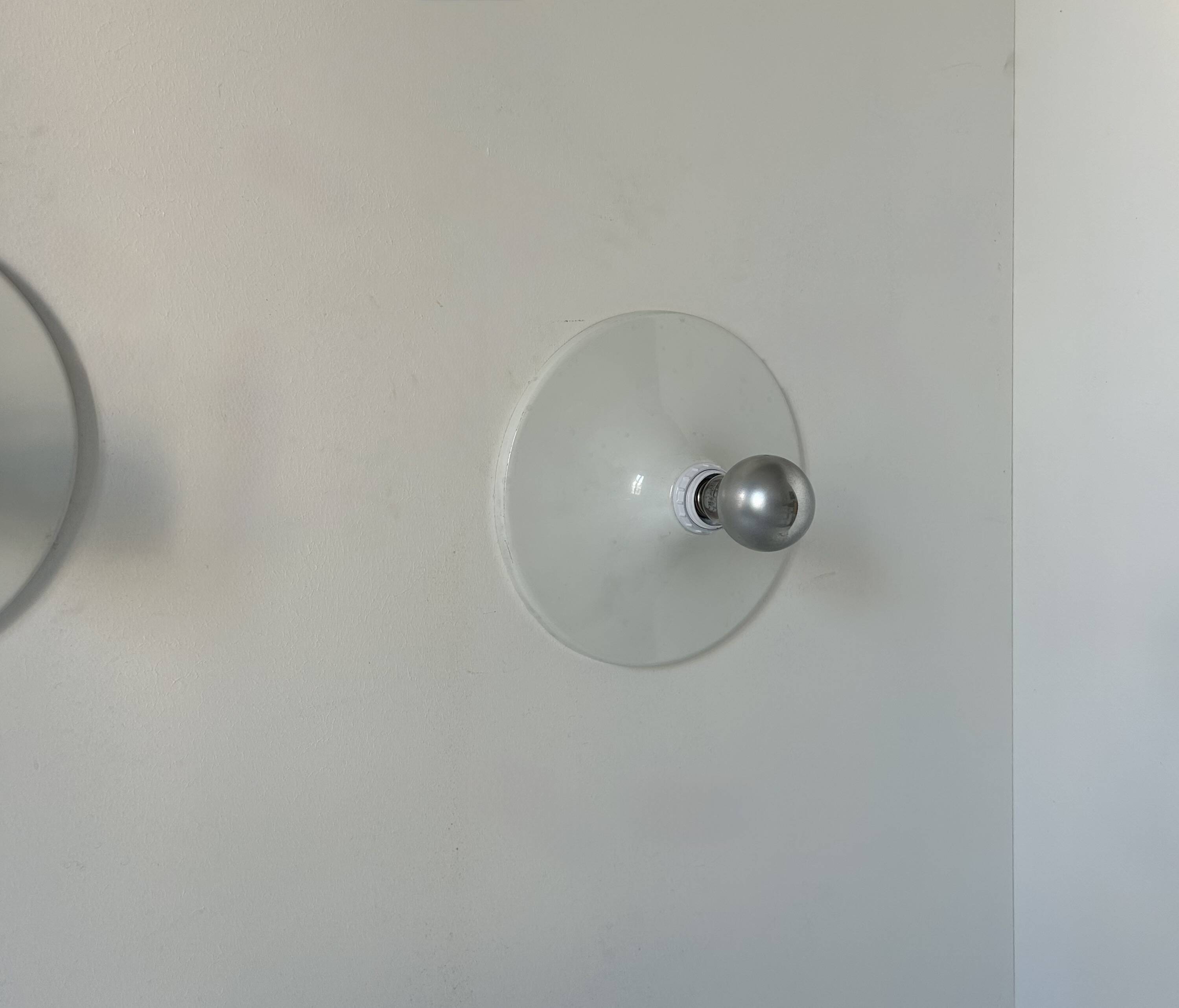 Pair of vintage wall lights, white lacquered metal, Italy 1970.