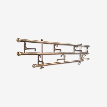 Brass towel holder or key door