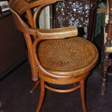 J.J. Kohn barber's chair in curved wood and spring mechanism