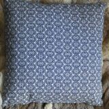 Blue cushion with royal pattern