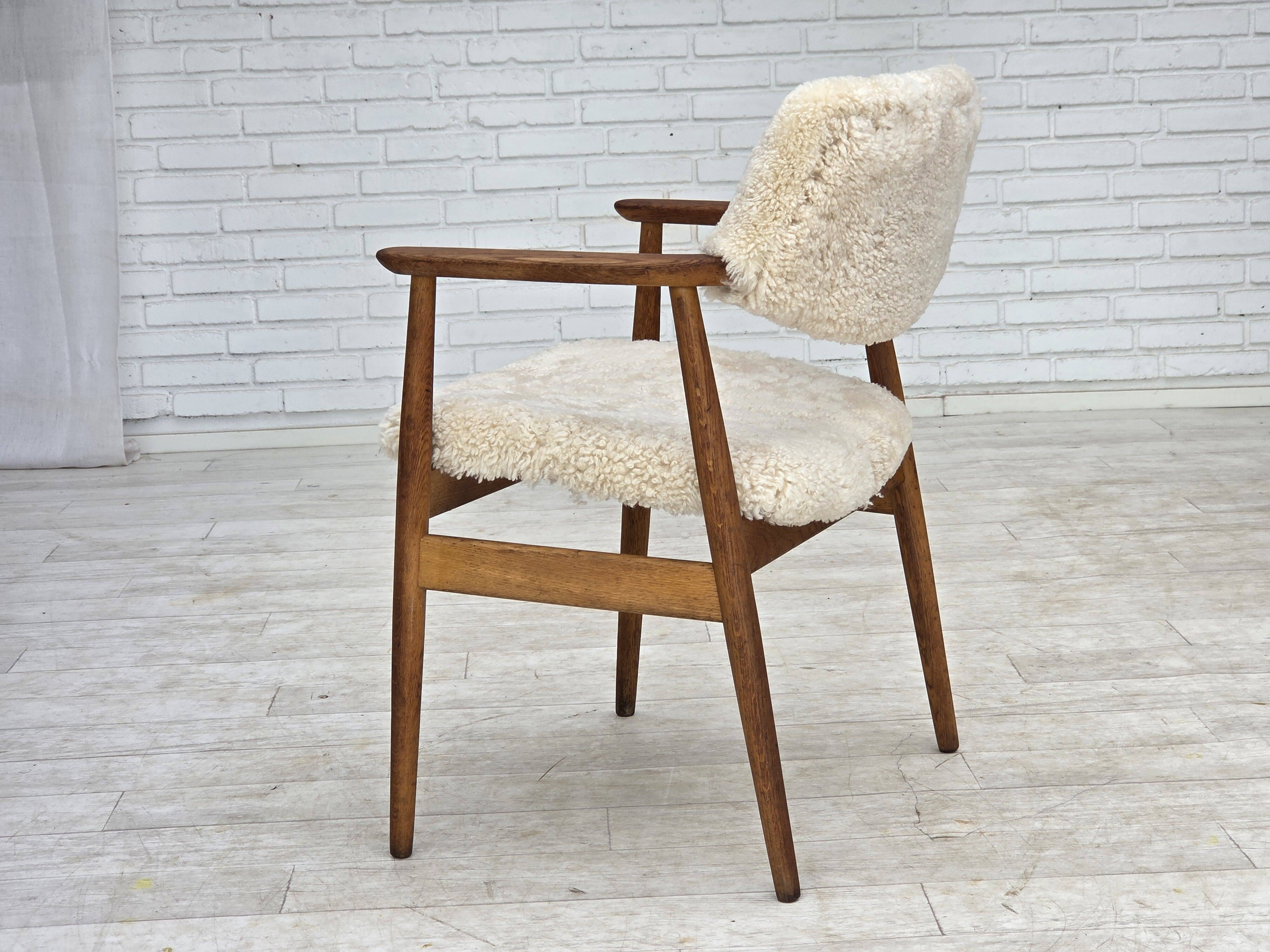 1960s, Danish design by Erik Kirkegaard, model 43, genuine sheepskin.