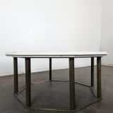 1940s octagonal coffee table with a marble top.