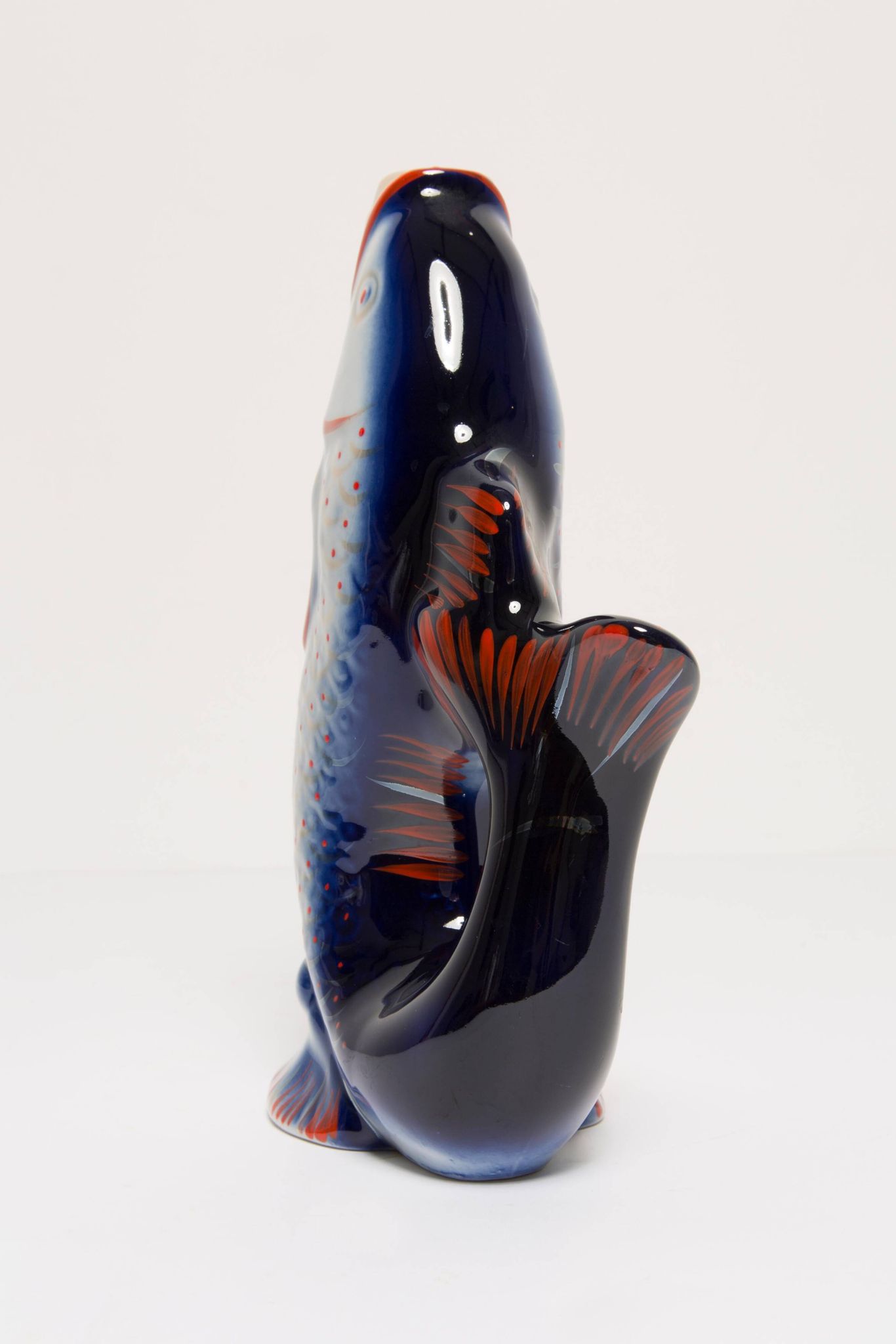 Set of 7 blue glass fish, mid-20th century.