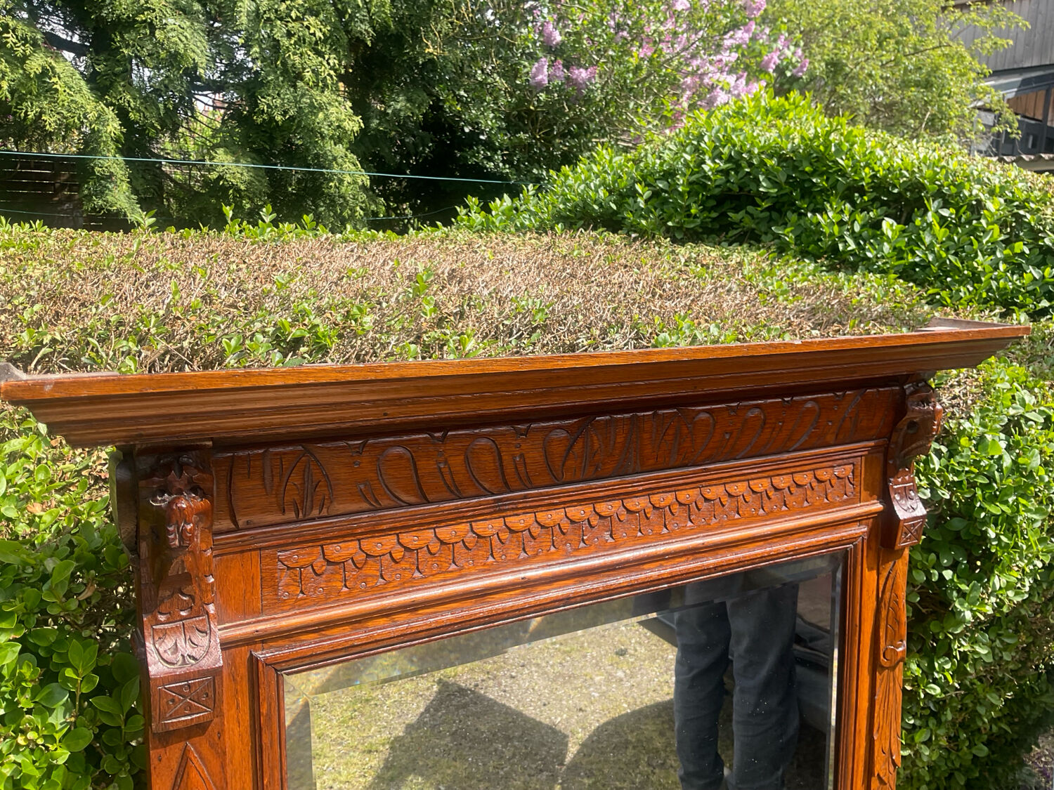 Antique large trumeau mirror in solid wood and bevelled glass.