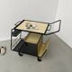 Perforated metal serving trolley in the Mathieu Matégot style