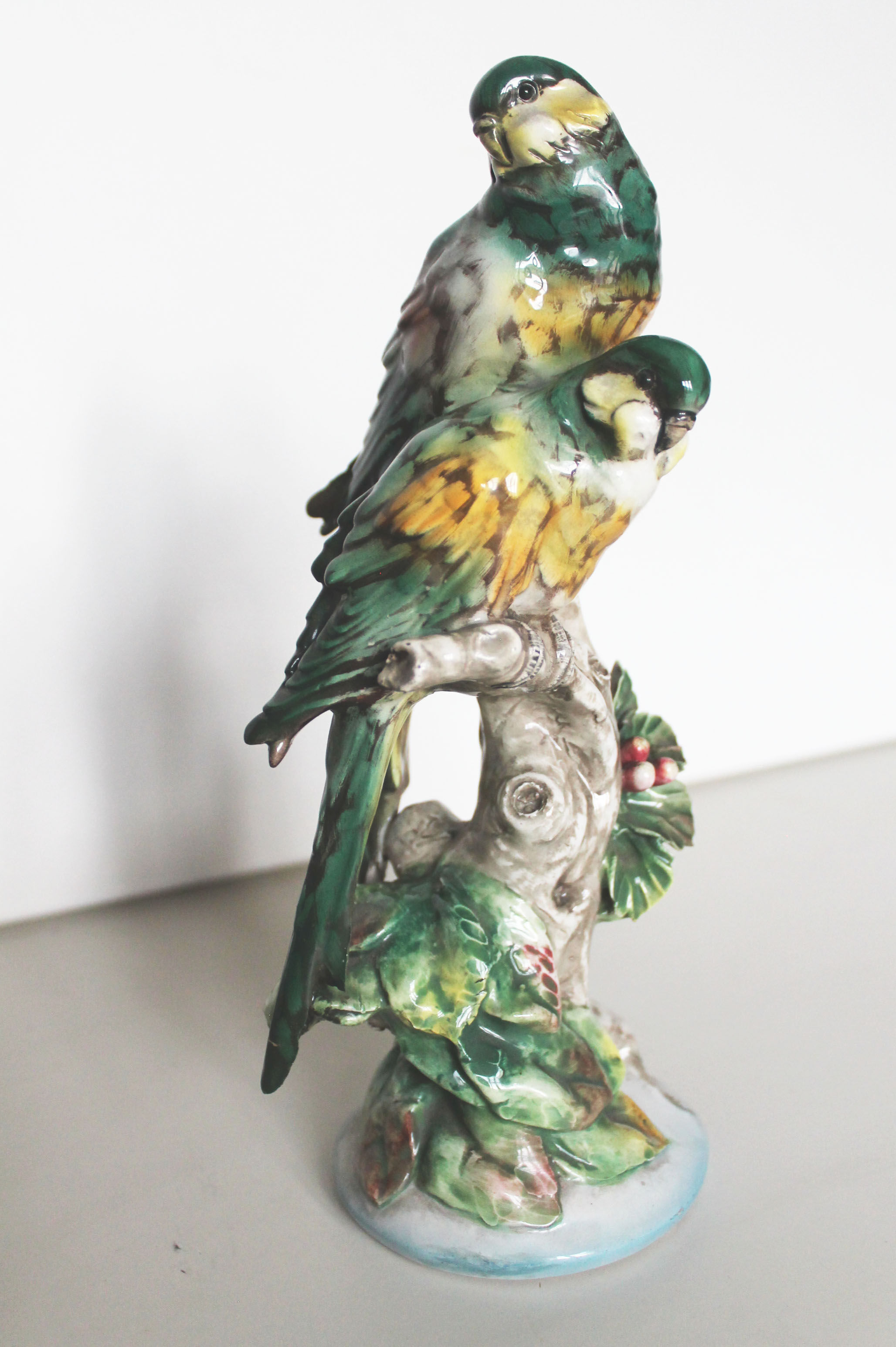 Couple of ceramic parakeets