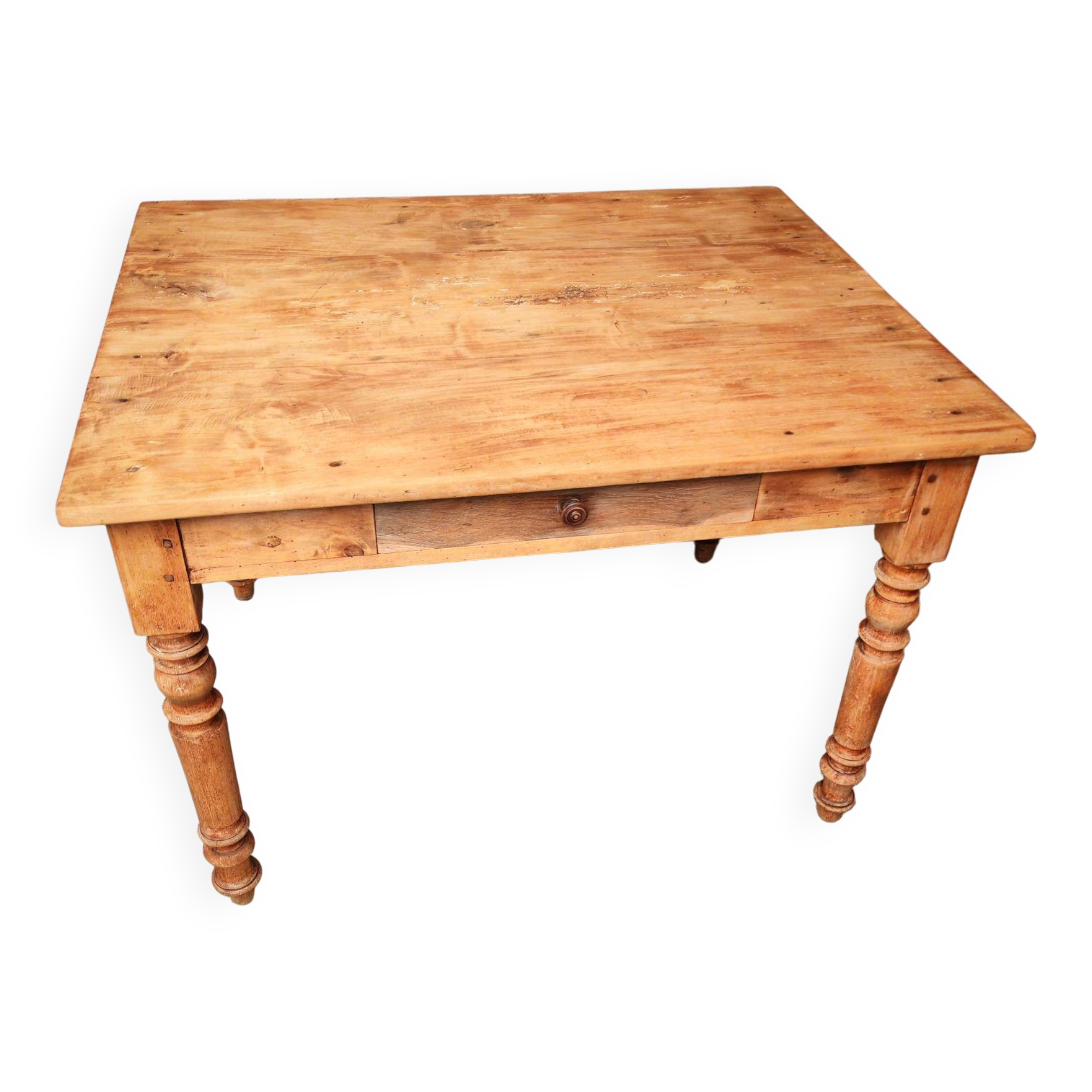 Small farmhouse table in light wood and tiled floors