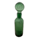 Old cracked glass carafe