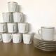 Coffee service with 11 cups and 6 saucers made of Limoges porcelain.
