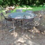 Garden table with wrought iron base