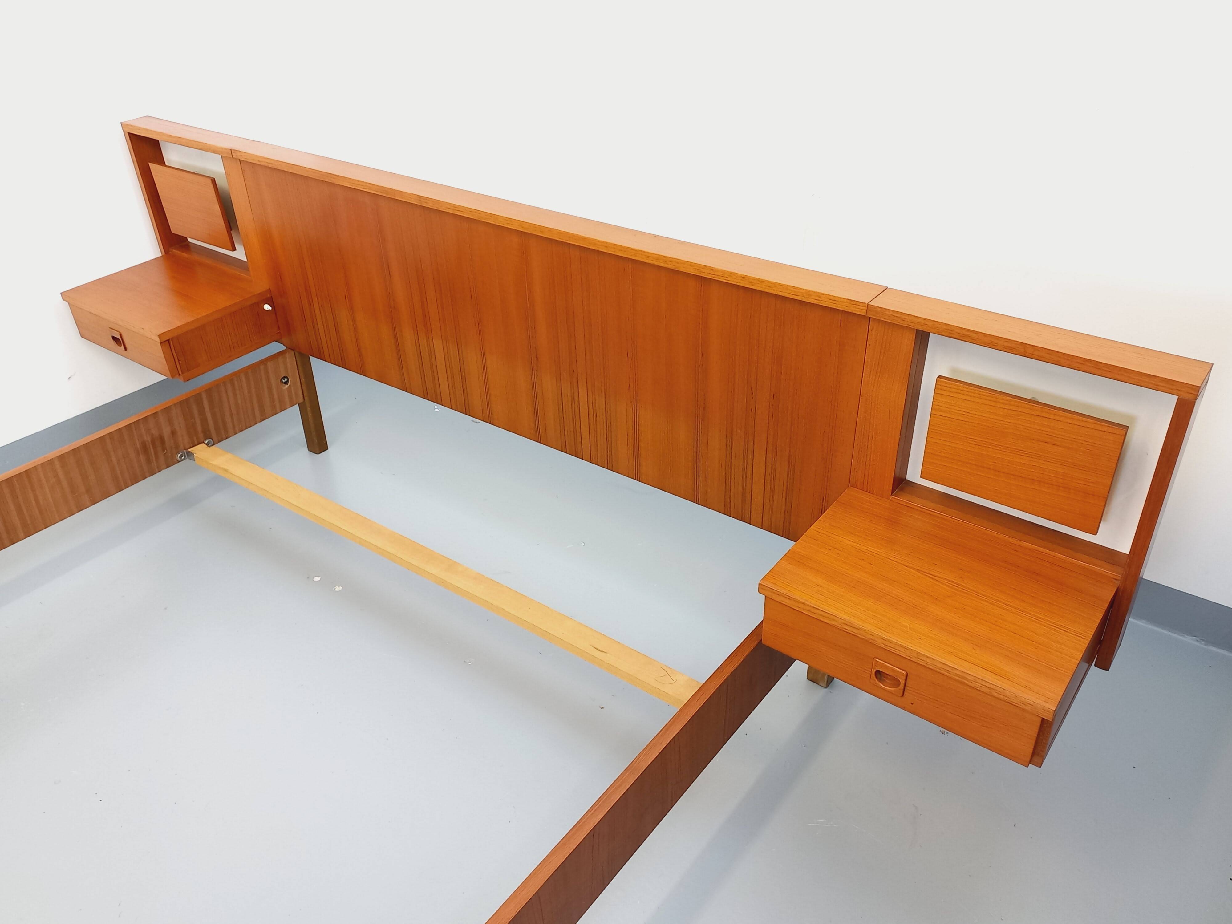 Vintage Scandinavian style double bed in teak from the 60s with integrated bedside lights