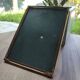 Vintage photo frame in gold and decorated metal