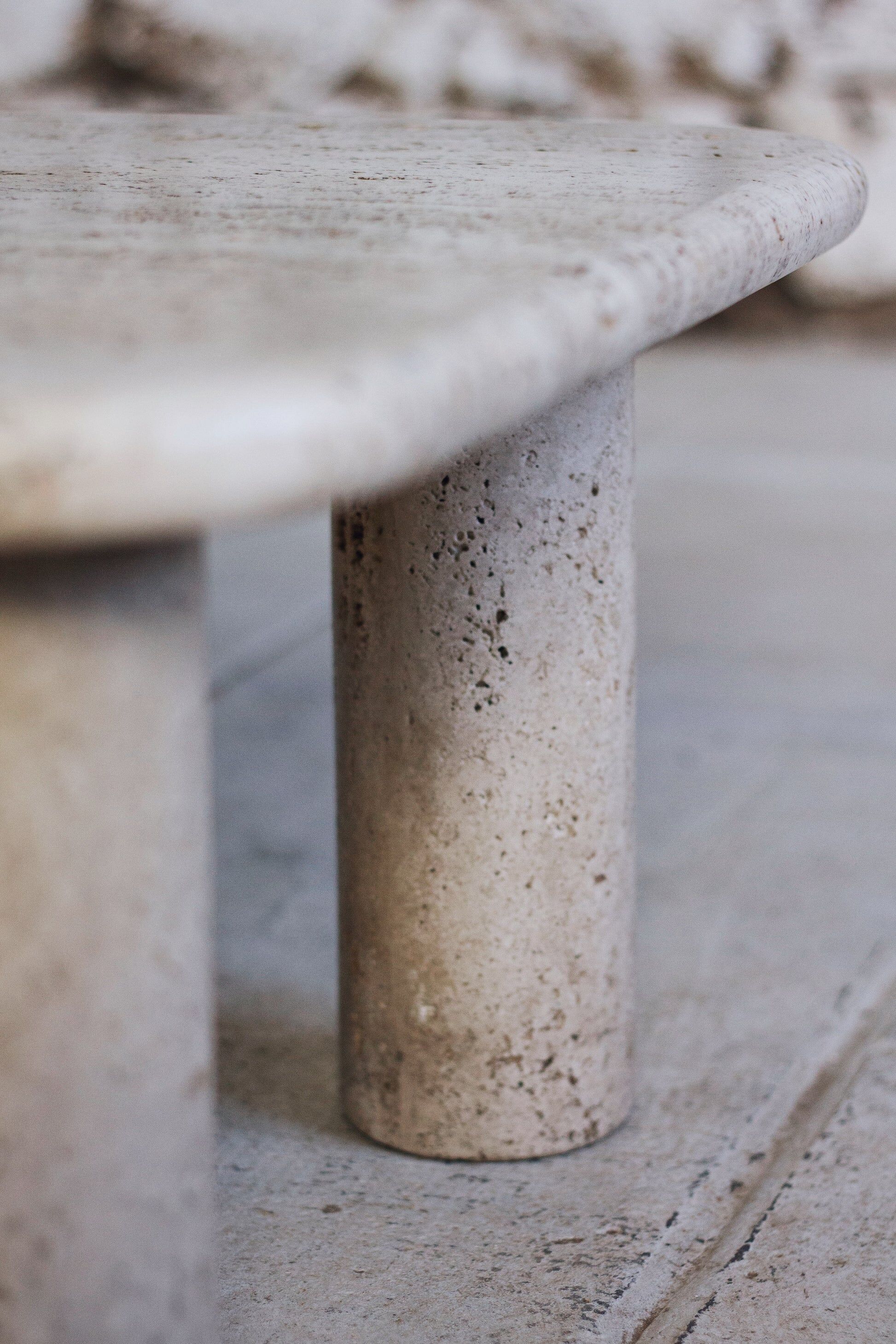Travertine coffee table in the style of Angelo Mangiarotti, 1970.
