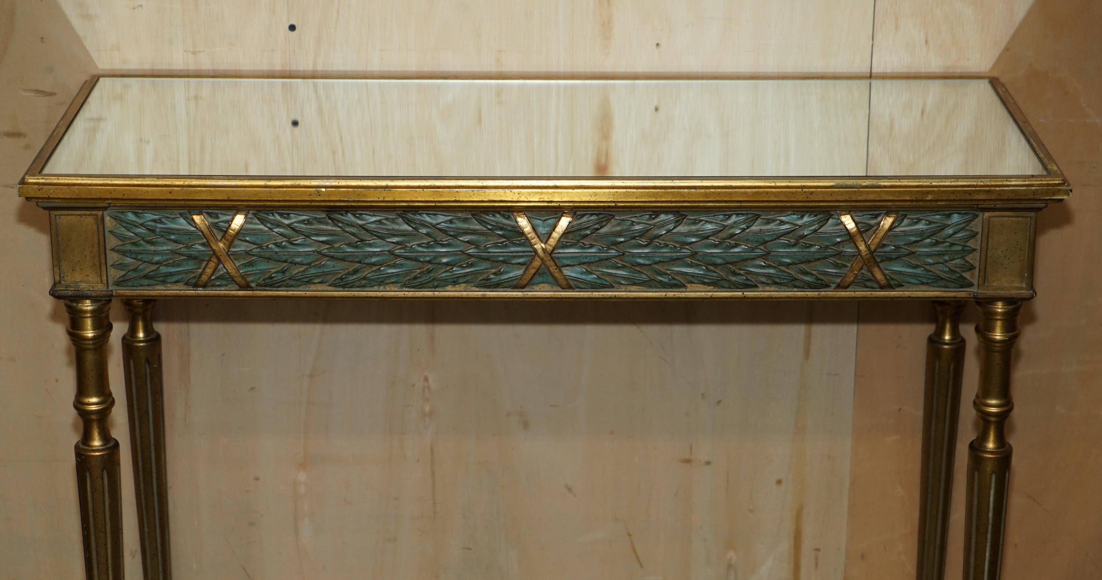 Italian vintage console with a glass mirror top.