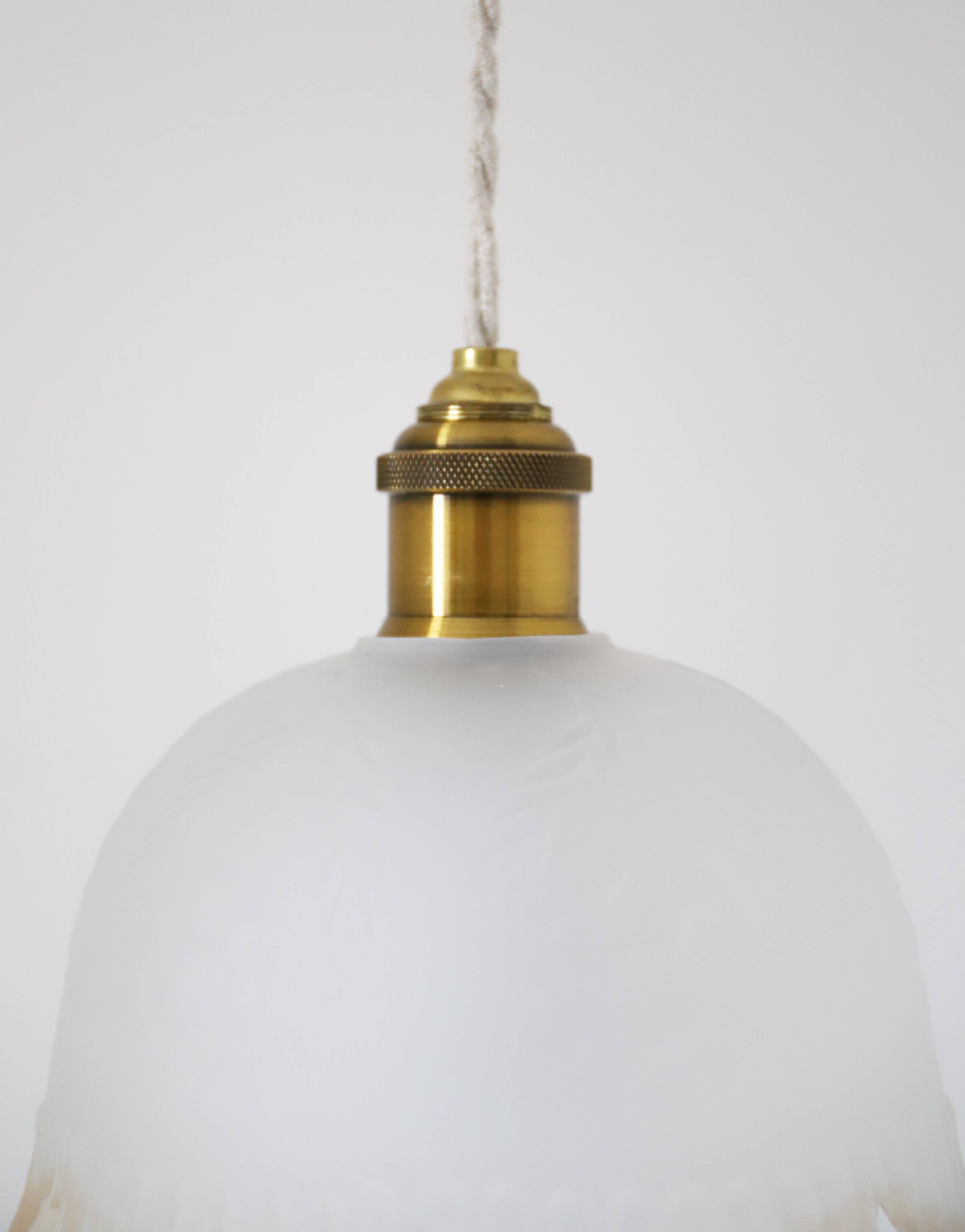Frosted glass pendant light with floral pattern and wavy edge
