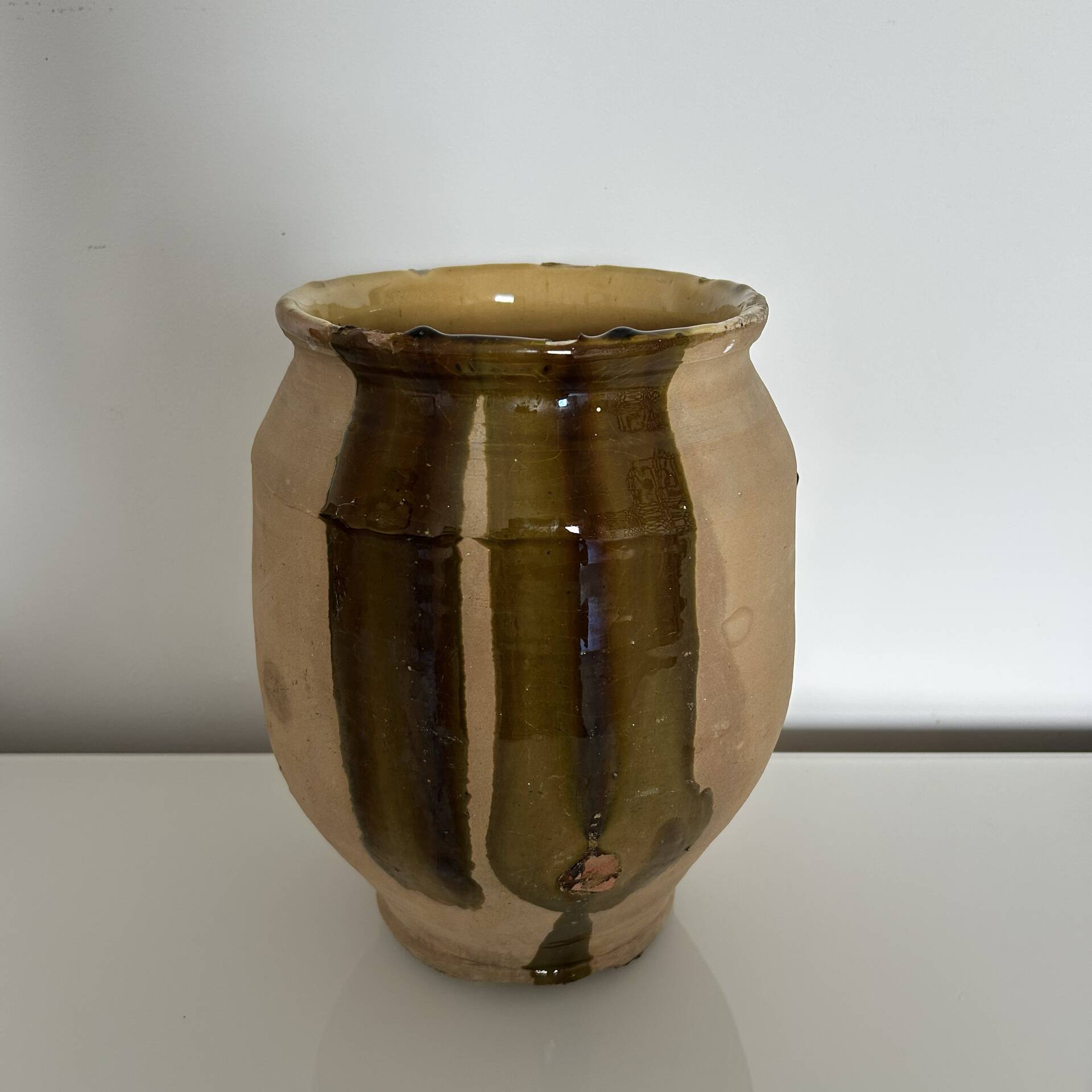 Old jar with brushstroke decoration