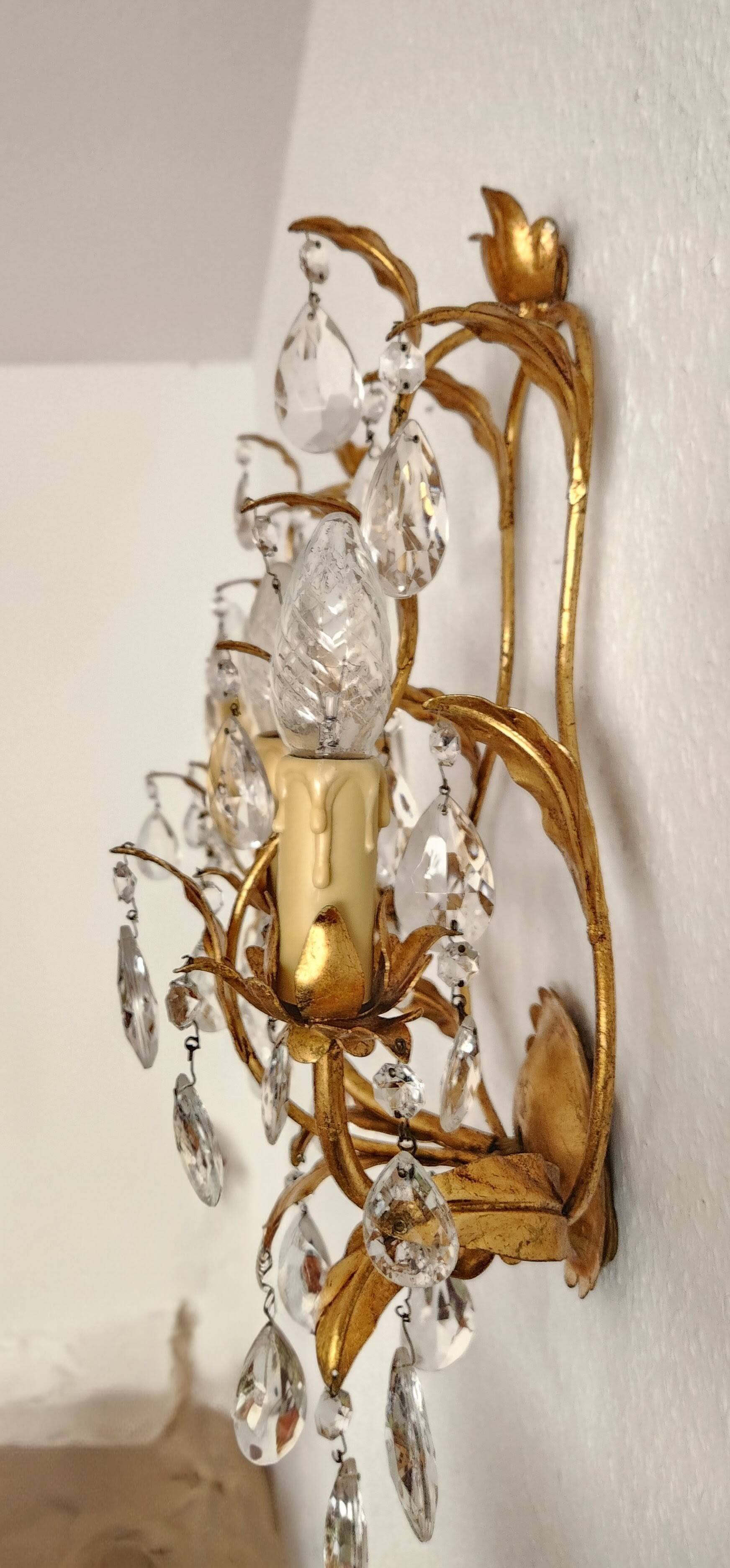 Hand-forged wall lamp gilded with gold leaf and crystals, Italy