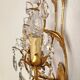 Hand-forged wall lamp gilded with gold leaf and crystals, Italy
