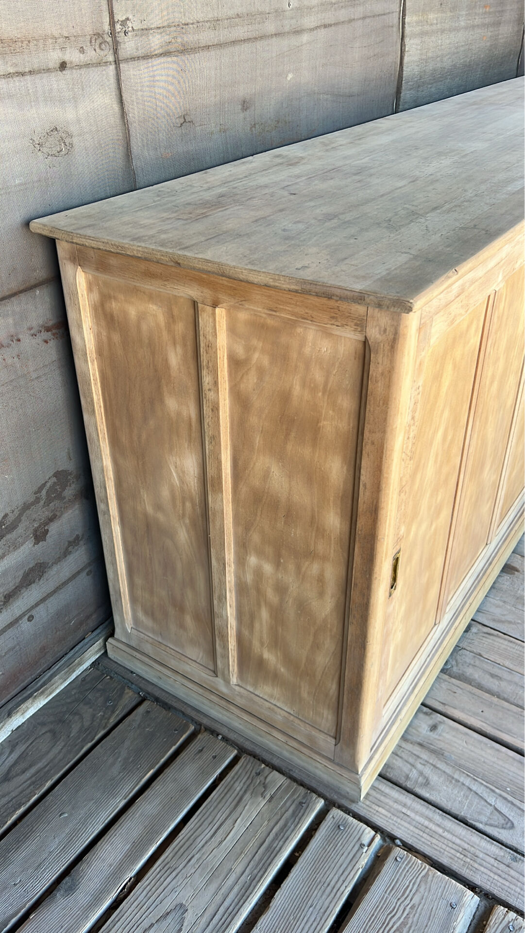 Old counter with sliding doors in raw wood