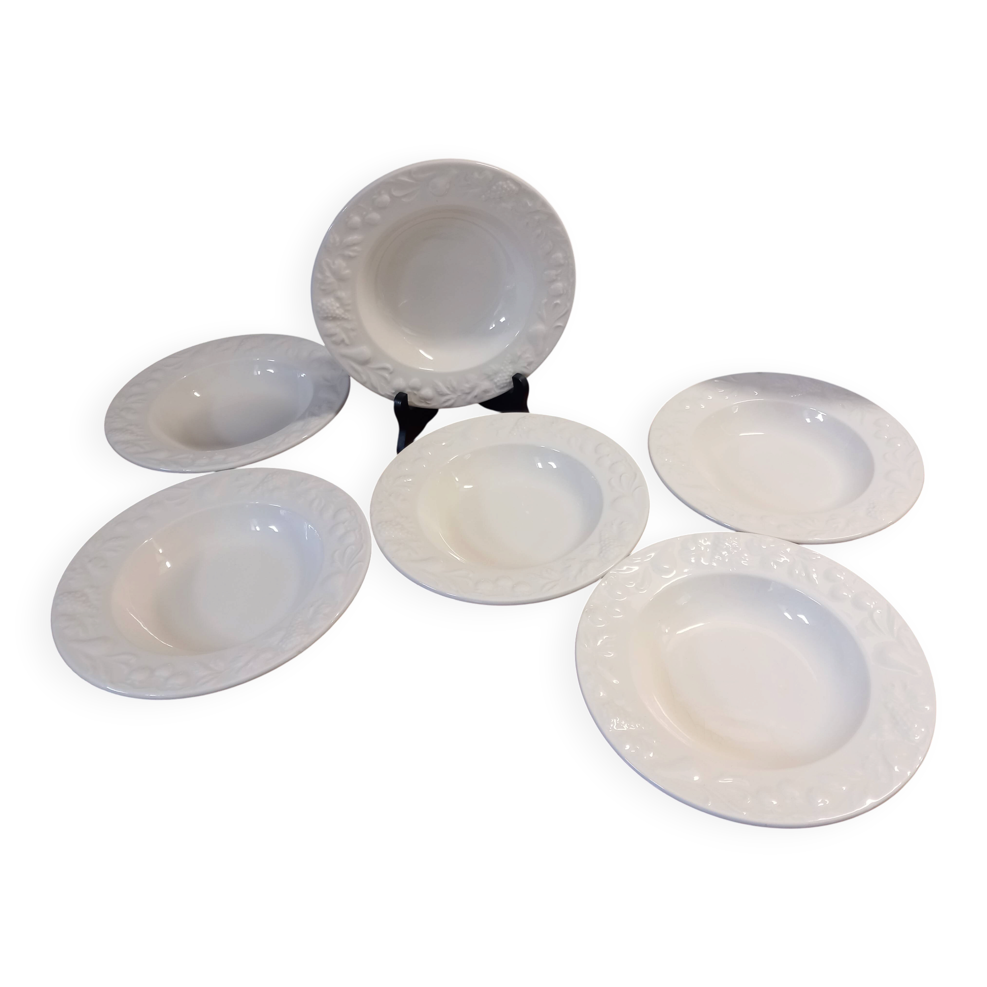 Set of 6 white ceramic deep plates made in Italy.