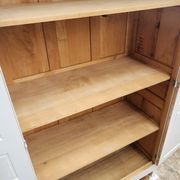 Antique Parisian wardrobe in white wood with shelves from the 1950s.