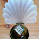 Pair of Deknudt shell wall lights