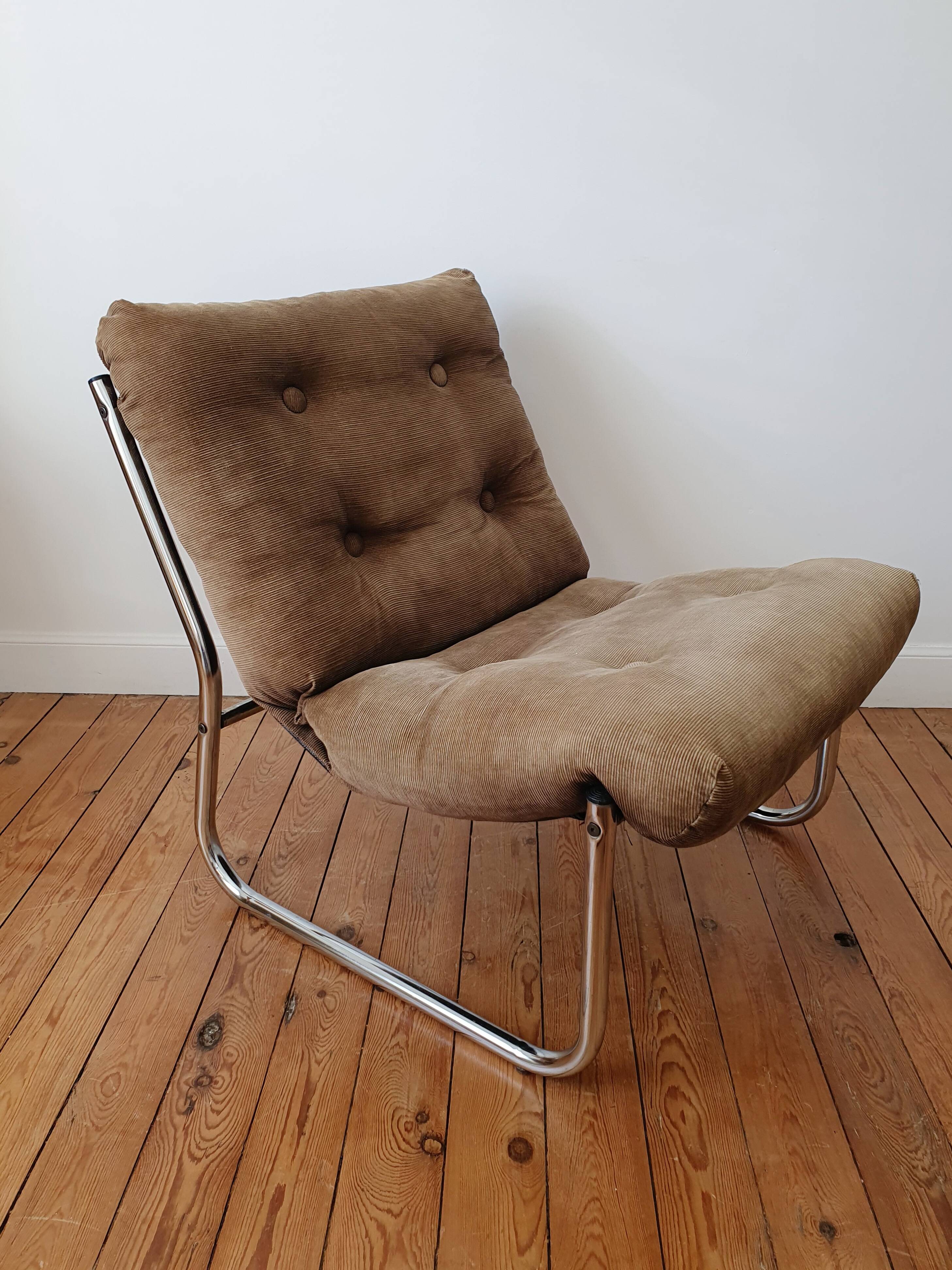 Vintage tubular chrome and velvet armchair