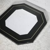 Miroir années 70, bois laqué noir, liseret  laiton. Octogonal