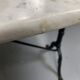 Set of two bistro tables in marble and wrought iron