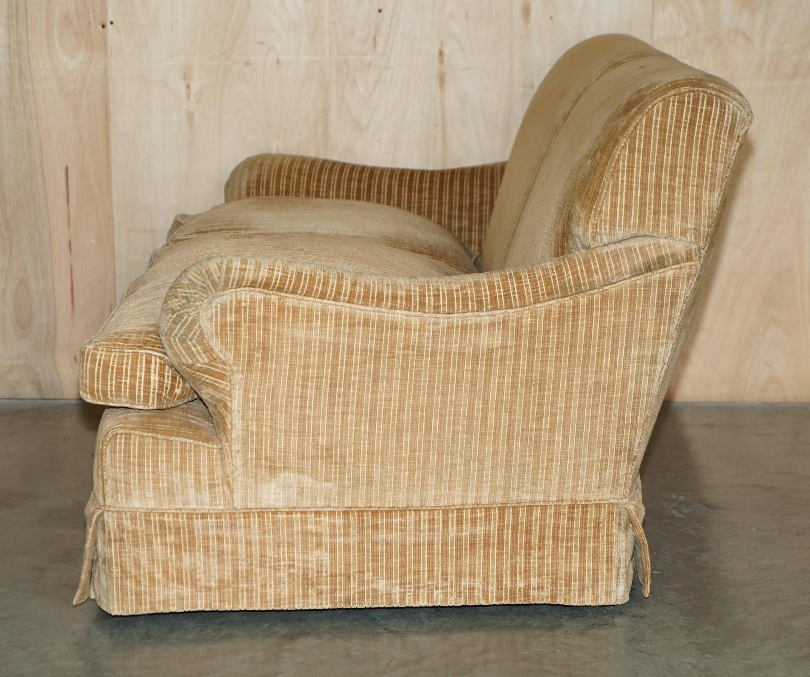 Howard & Sons / Chairs Ltd two-seater canapé with feather-filled cushions.