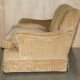 Howard & Sons / Chairs Ltd two-seater canapé with feather-filled cushions.