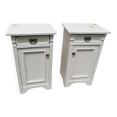 Pair of white wooden bedside tables.