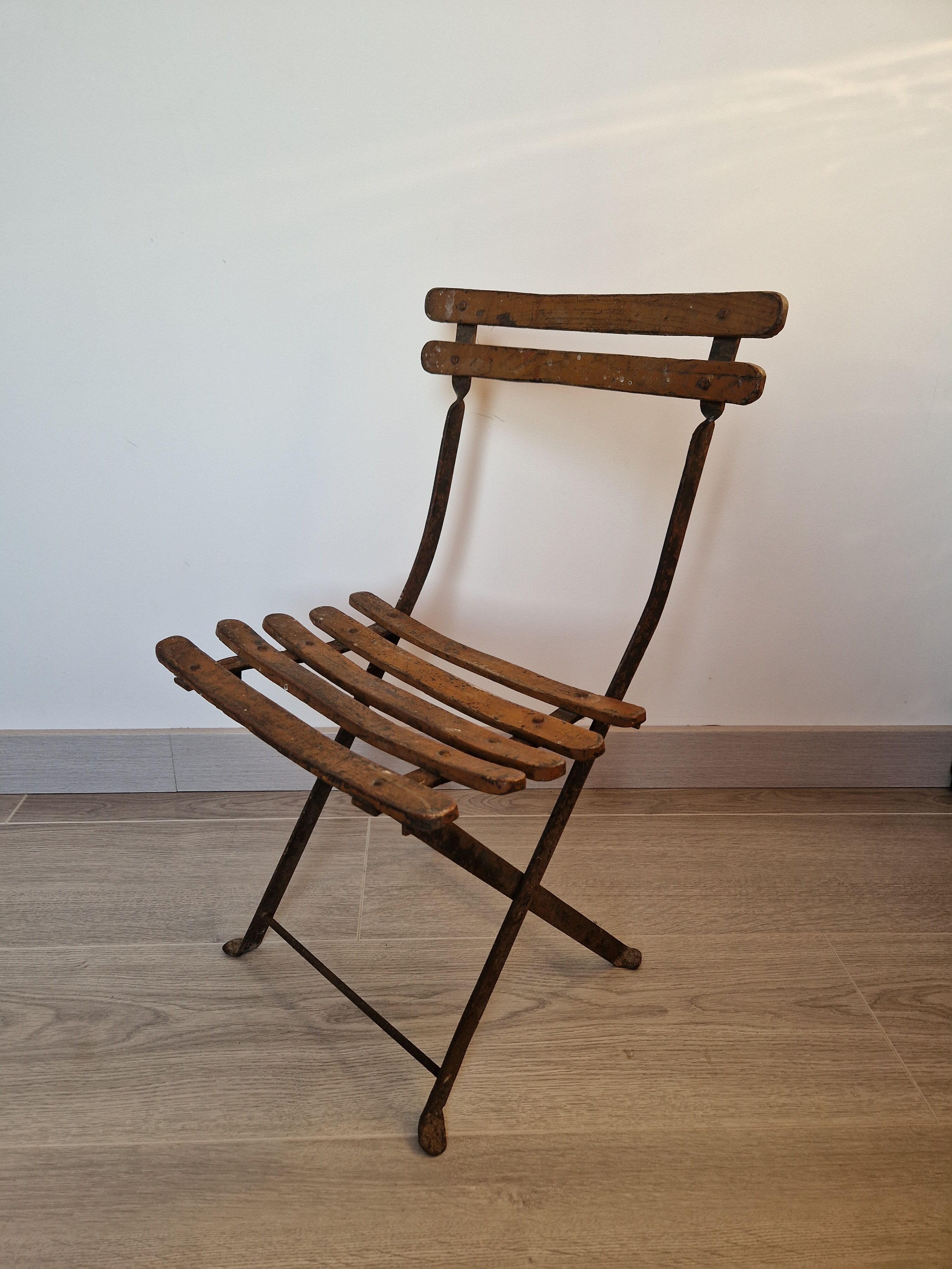 Old folding garden chair for children
