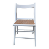 Vintage folding chair in white wood with wicker seat