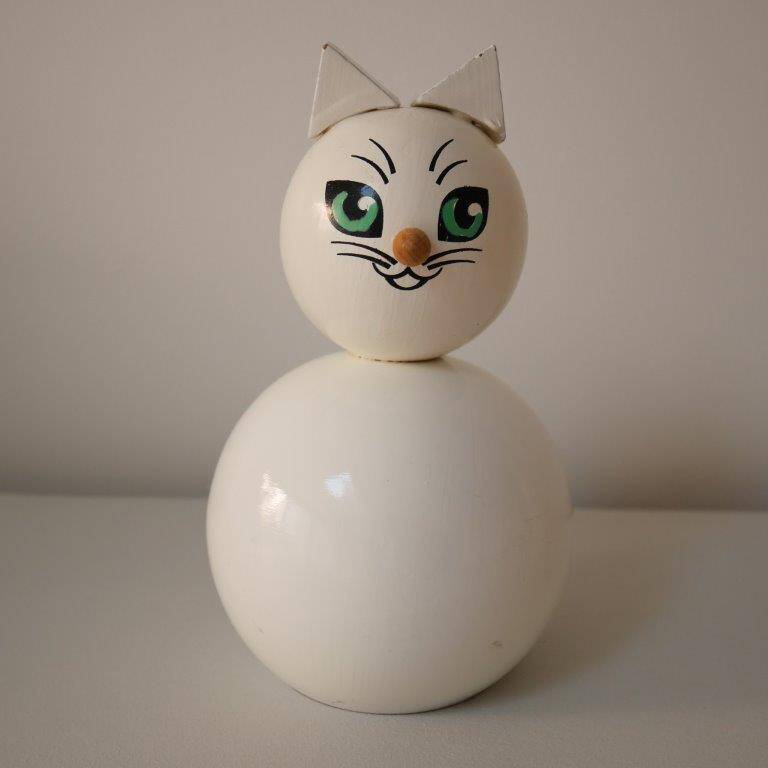 Wooden piggy bank, white cat