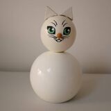 Wooden piggy bank, white cat