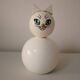 Wooden piggy bank, white cat