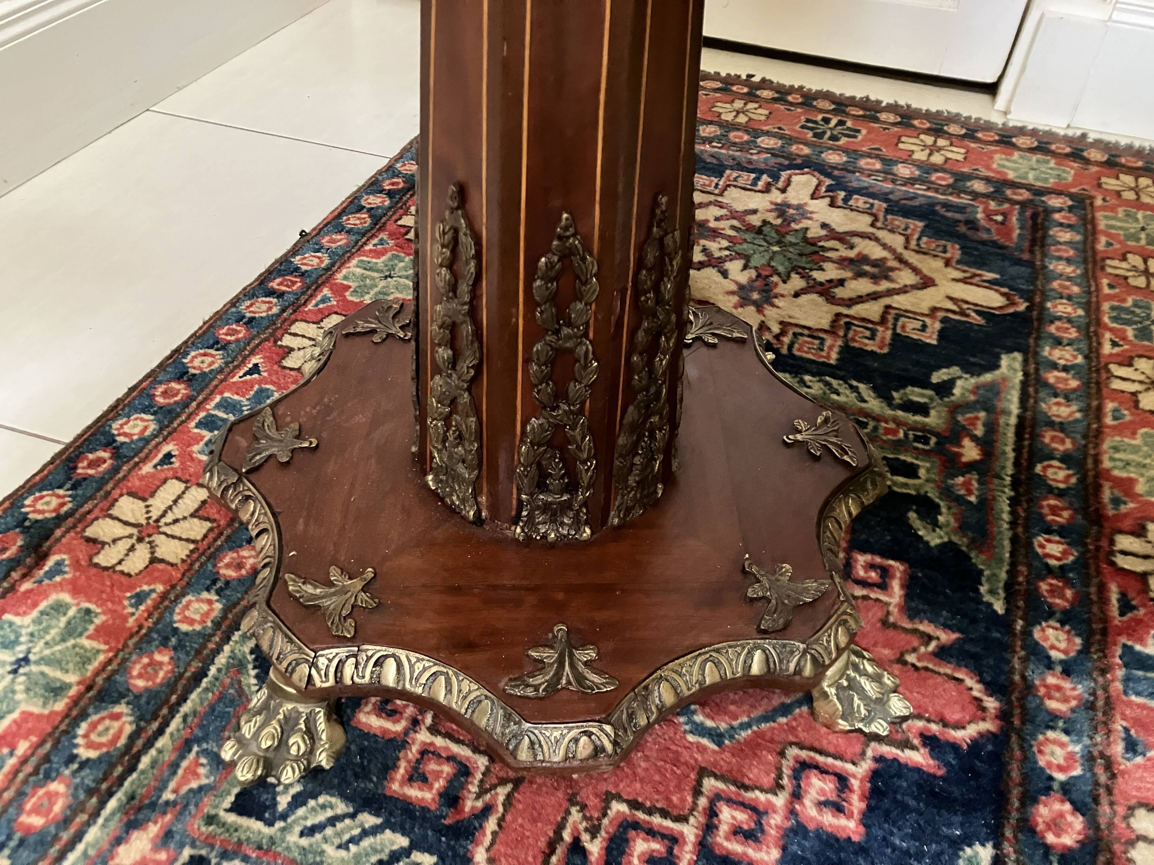 Marquetry pedestal table from the end of the 19th century
