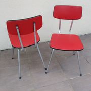 2 red chairs vintage