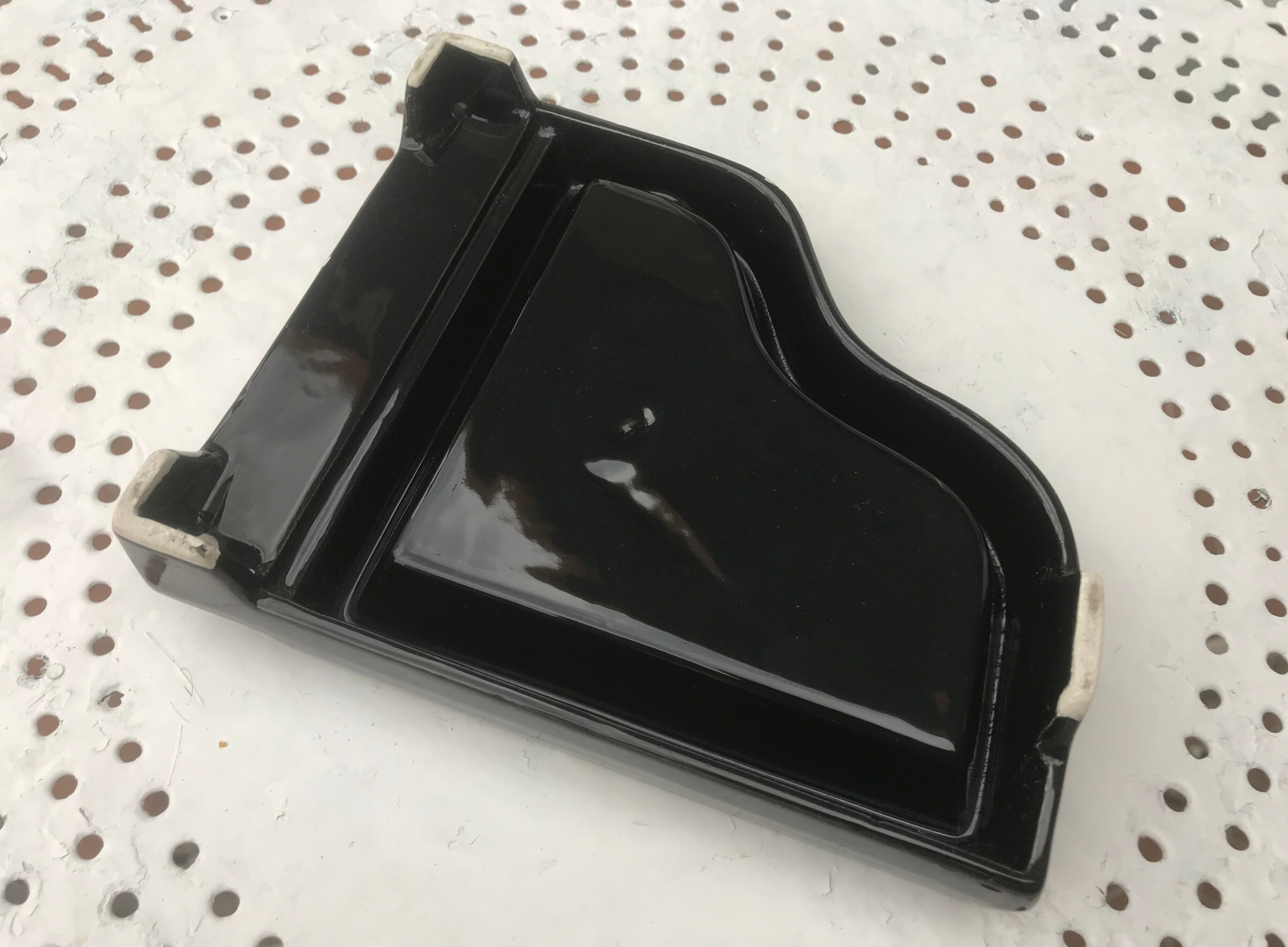 Old ceramic piano ashtray