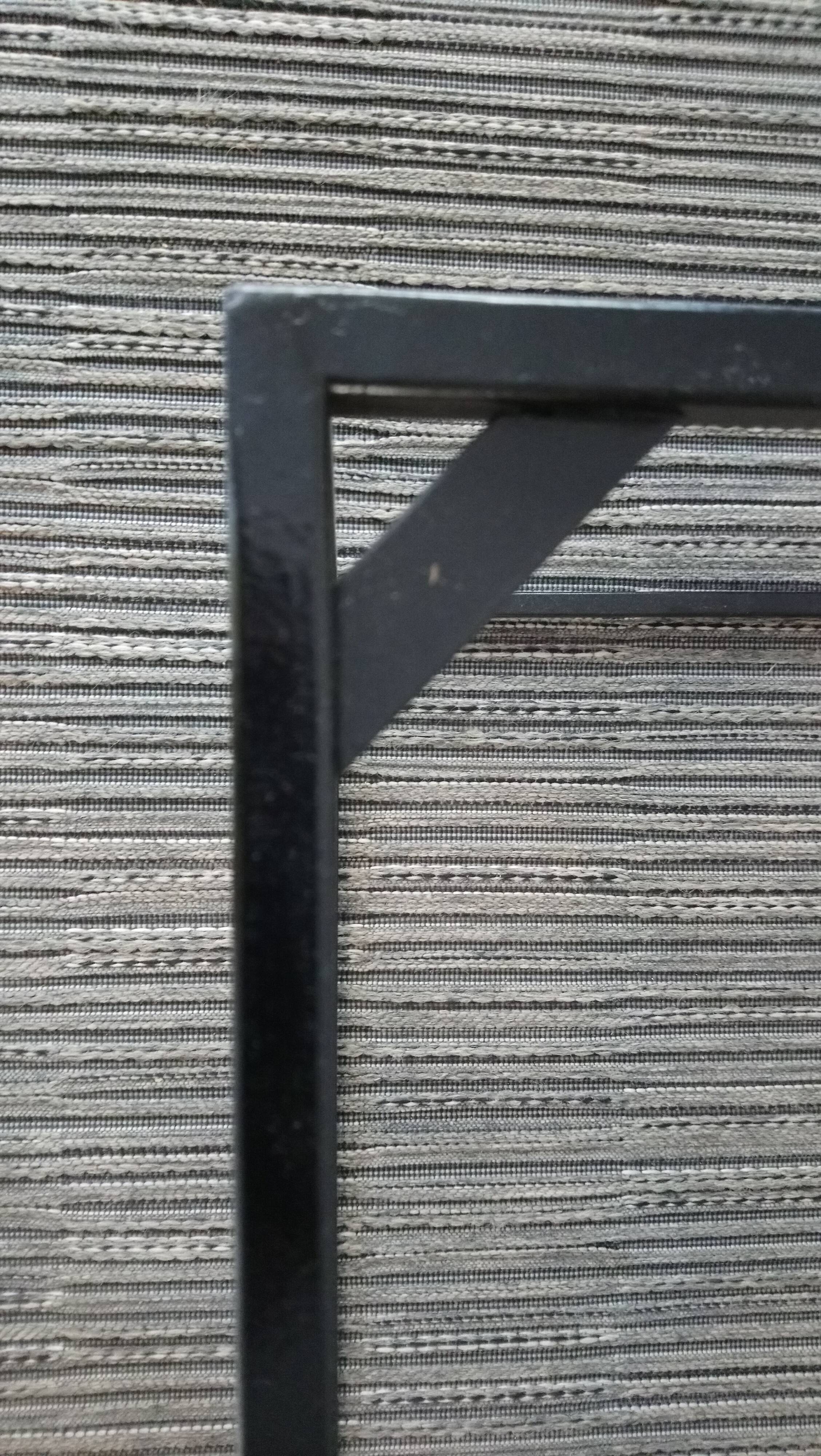 Square coffee table has checkered 80s