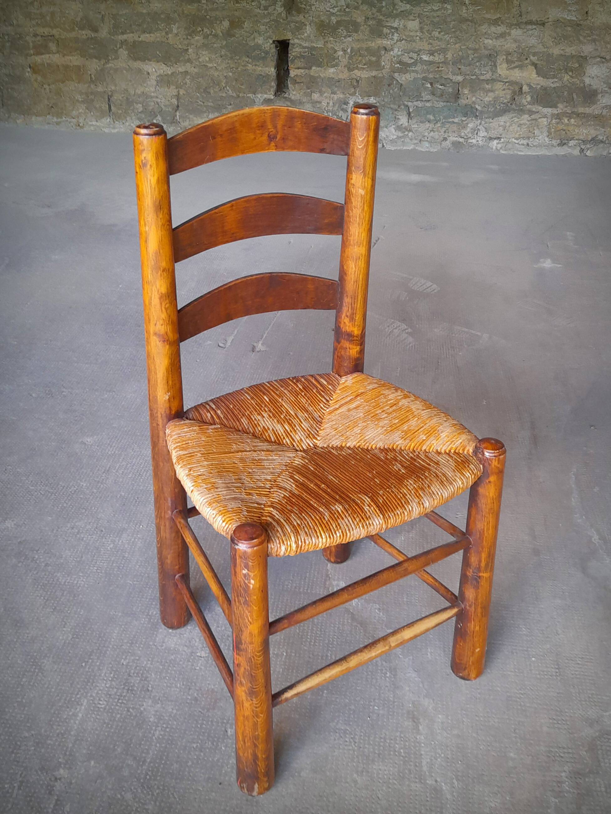 Set of 4 straw-covered brutalist chairs by George Robert